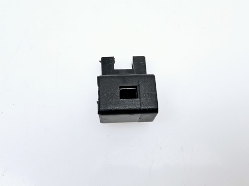 Wspornik skrzynki bezpieczników Fiat Uno   nowy oryginalny nr kat 7571007