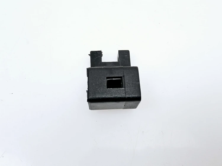 Wspornik skrzynki bezpieczników Fiat Uno   nowy oryginalny nr kat 7571007