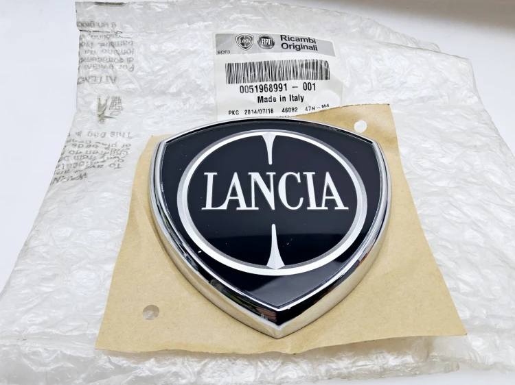 emblemat, znaczek przód Lancia Delta 3  - nowy 51968991