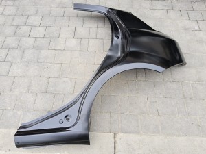 błotnik tylny lewy Fiat Grande Punto - nowy oryginalny 71754200