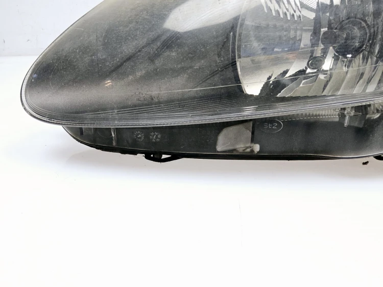 reflektor, lampa przednia Fiat Grande Punto lewy czarny