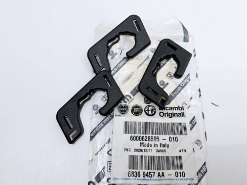 zaczep, uchwyt, spinka półki tylnej Fiat 500 X lewy - nowy  6000626595
