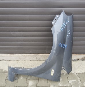 błotnik przedni lewy Fiat Grande Punto szary metalik 634/C